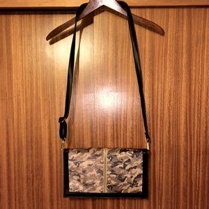 Brand new, NEVER used vegan? leather clutch with detachable shoulder strap.